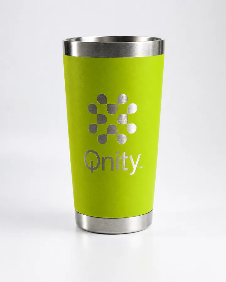 Green powder-coated tumbler with a logo laser engraved through to the steel